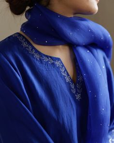 Floral embroidery detail on the neckline of this beautiful Cobalt Blue kurta set with hand done Mukaish organza dupatta. White And Blue Embroidery, Anarkali Embroidery Designs, Emrodary Work Design Kurti, Neckline Embroidery, Stylish Kurtis Design, Blue Kurta, Designer Kurti Patterns, Salwar Designs