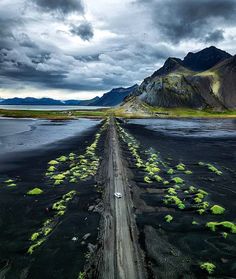 an aerial view of a road in the middle of nowhere