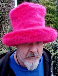 A quite spectacular shocking pink faux fur top hat shaped hat! A luxury short pike fur fabric. Quite a statement piece! And another one for all those Space Cowboys out there! Hat is approx 6 inches tall and brim is approx 3.5 inches wide. Brim can be worn turned up, or down. This hat can also be worn with the top looking tall, or you can squash it all down to suit. All made to order so any size possible! If your size is not in the drop down list , let me know. Playful Pink Mini Hat, One Size Fits Most, Affordable Pink Novelty Hats, Funky Pink Hat With Curved Brim, Pink Fluffy Bucket Hat, Pink Fur Hat, Faux Fur Top, Fur Top, Faux Fur Hat, Shocking Pink