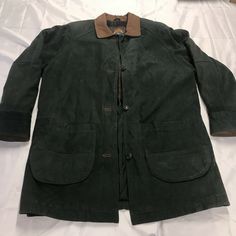 WOMEN'S ADVENTURE BOUND WILSONS DUFFLE COAT SZ Large GREEN SUEDE With LINING. This vintage jacket is In good condition does have one spot at the bottom of the jacket please see photos. This will come out if you take the time to clean unfortunately I have too many items to do this with so I’m listing it at this discounted price. Please see photos. If you have any questions please feel free to ask. Thanks for looking at a listing. We hope you have a great day! Green Fall Sport Coat With Button Closure, Classic Green Outerwear For Outdoor, Green Sport Coat With Button Closure For Fall, Green Sport Coat For Fall, Green Long Coat For Outdoor Wear, Classic Green Sport Coat For Outdoors, Classic Green Sport Coat For Outdoor, Green Long Coat For Outdoor, Green Outerwear With Button Closure For Outdoor