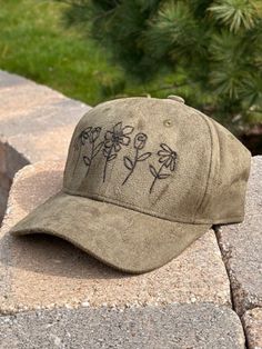 This hand burned design is perfect for the spring and summer! Each hat is one of a kind, no two hats are identical.  The baseball hat is a fitted style and is made of faux suede with an adjustable metal buckle. One size fits most. Hand Burn, Hat Baseball, Fitted Style, Summer Hat, Baseball Hat, Summer Hats, Adjustable Hat, Wood Burning, Metal Buckles