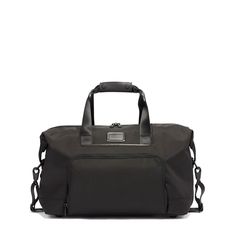 With an impressive 13" of expanded depth to maximize packing capacity, this travel satchel is the one to grab for long weekends. Plus, a generous front pocket gives you quick access to key essentials. Dimensions 11.5" X 18.5" X 9.0" Expanded Depth 13.0" Weight 3.5 LB Exterior Zip entry to main compartment Double zip three-quarter expansion Front U-zip pocket Front slip pocket with magnetic snap Leather-wrapped top carry handles Detachable padded shoulder strap Add-a-Bag Sleeve Interior Open cavi Flight Bag, Holdall Bag, Sac Lunch, Leather Wraps, Travel Gifts, Duffel Bag, Luggage Tags, Travel Luggage, Satchel Bags