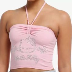 Hello Kitty Meets Y2k On This Pink Halter Top Featuring Her Face And Name In Rhinestones, And Pink Beads On The Halter Straps. 95% Cotton; 5% Spandex Wash Cold; Dry Low Length: 9" Imported Listed In Junior Sizes This Goes Well With The Hk Skirt I Have Listed Hello Kitty Rhinestone, Pink Halter Top, Emily The Strange, Plus Size Swim, Tall Hoodies, Pink Hello Kitty, Plus Size Fits, Rhinestone Designs, Pink Beads