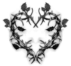 a black and white photo of leaves on the side of a face with an intricate design