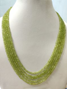 Name Of Stone                       : Peridot Cut                                            : Faceted Color                                         : Green   Shape                                        : Roundel Beads Size                                : 3 - 3.5 mm approx. Number of Strand                   : 5 Lines  * Cut & Polished in India * 100% natural & genuine * Measurements & weight are close approximations * We take order work as well. Feel free to contact for purchasing goods in bu Faceted Bead Necklace, Gemstone Beaded Necklace, Rose Quartz Beads, Cabochon Ring, Peridot Gemstone, Necklace Online, Topaz Gemstone, Faceted Gemstones, Rings For Her