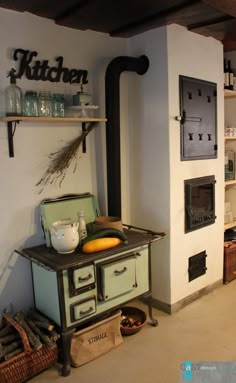 an old fashioned stove and oven in a kitchen