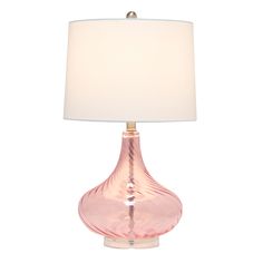 a pink glass table lamp with a white shade