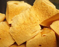 a pile of tortilla chips sitting on top of a table