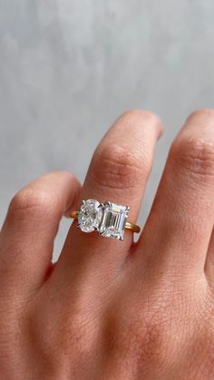 Introducing our exquisite 3 Carat Toi Et Moi Oval & Emerald Cut Art Deco Engagement Ring, a masterpiece of handmade jewelry. This lab grown CVD diamond ring is the perfect personalized anniversary gift. With its timeless design and superior craftsmanship, it guarantees to impress. 𝐅𝐞𝐚𝐭𝐮𝐫𝐞𝐬: * 𝐌𝐚𝐝𝐞 𝐭𝐨 𝐎𝐫𝐝𝐞𝐫 * 𝐌𝐞𝐭𝐚𝐥: 𝟏𝟒𝐊 𝐆𝐨𝐥𝐝 | 𝟏𝟖𝐊 𝐆𝐨𝐥𝐝 | 𝟗𝟓𝟎 𝐏𝐥𝐚𝐭𝐢𝐧𝐮𝐦 * 𝐁𝐚𝐧𝐝 𝐂𝐨𝐥𝐨𝐫𝐬: Rose Gold, Yellow Gold & White Gold 𝐂𝐞𝐧𝐭𝐞𝐫 𝐬𝐭𝐨𝐧𝐞: * 𝐒𝐭𝐨𝐧𝐞 Timeless Engagement Ring And Wedding Band, Toi Et Moi Oval And Emerald, Personalized Anniversary Gifts, Cvd Diamond, Art Deco Engagement, Jewelry Personalized, Deco Engagement Ring, Personalized Anniversary, Art Deco Engagement Ring