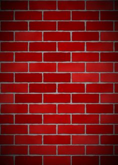 a red brick wall that is very dark