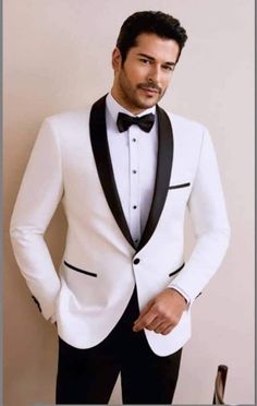 Are you planning a wedding or other social event that you want to look good and stand out in the crowd? Then this suit is a must have.  It is carefully made and finished with the best of fabric.  It comes in white color but can be customized in any color of your choice.  Product Details: 1. White 2 piece single breasted suit (jacket/coat & pants). 2. Sewed with a blend of cotton and wool fabric of high quality.  3. Comes in sizes XS to 3XL. For larger sizes, kindly contact us. 4. It is a custom Elegant Wedding Outerwear With Shawl Collar, Luxury Shawl Collar Wedding Outerwear, Luxury Wedding Blazer With Shawl Collar, Luxury Shawl Collar Wedding Blazer, Designer Outerwear With Suit Collar For Wedding, Fitted Suit With Shawl Collar For Wedding, Designer Fitted Outerwear For Wedding, Designer Wedding Outerwear With Suit Collar, Fitted Wedding Suit With Shawl Collar