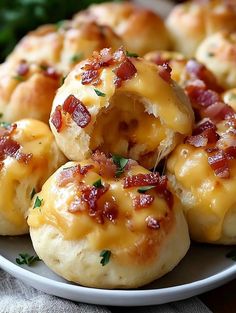 bacon and cheese rolls on a plate with parsley