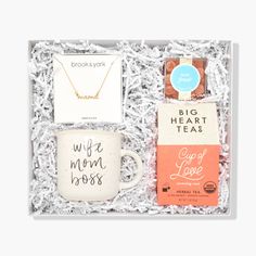 a gift box with coffee, tea and books