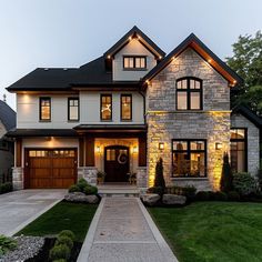 a house with lights on the front and side of it