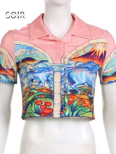 Step back in time while embracing the wonders of modern design with our Wakiki Retro Pink Vacation Lapel Polo Cropped Top. Painted against a nostalgic pink canvas, this cropped polo is adorned with an eclectic collage that effortlessly merges the might of majestic volcanoes, the mystique of blue horses, and the allure of tropical vistas. Retro Lapel Polo Design: This top revives the classic polo style with its distinctive lapel collar, infusing a touch of vintage charm into your vacation wardrob Eclectic Collage, Pink Vacation, Top Designs For Women, Polo Crop Top, Cropped Polo, Polo Design, Pink Backdrop, Loose Clothing, Summer Streetwear