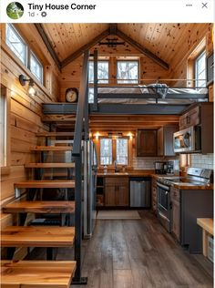 a tiny house with stairs leading up to the kitchen