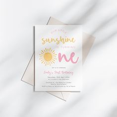 a card with the words, our little sunshine is turning one on it's first birthday