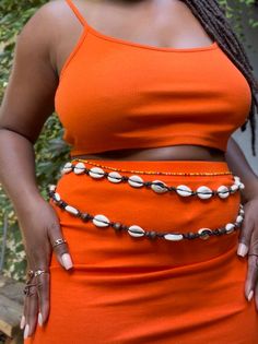 Cowrie Waist Beads, Waist Beads Over Dress, Wooden Waist Beads, Waist Bead Photoshoot Ideas, Cowrie Shell Waist Beads, Bohemian Black Beaded Necklaces For Summer, Bohemian Waist Beads For Summer Beach, Bohemian Waist Beads For Beach In Summer, Bohemian Summer Festival Waist Beads