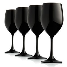 four black wine glasses lined up in a row