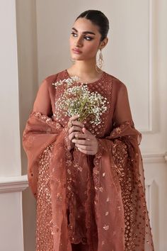 Envision yourself in this gorgeous original designer party wear copper brown color embroidered chiffon silk suit—the perfect blend of elegance and sophistication! Specially dyed silk trousers and an embroidered organza dupatta boasting all-over sequin embellishments and embroidered border complete the look. 3 Piece Top Pure chiffon silk Bottom dyed silk Embroidered organza dupatta Top length: 40"-43" Bottom length: 36"-39" Sleeves length: 21"-23" Top with lining Side slit Long Sleeves Straight p Dupatta Border, Bridal Dupatta, Organza Sleeves, Kurta Dress, Silk Bottoms, Embroidered Chiffon, Pure Chiffon, Copper Brown, Embroidered Organza