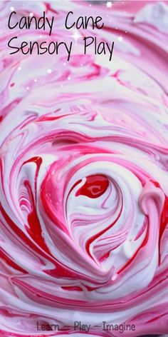 the candy cane play is made with pink and white swirled icing