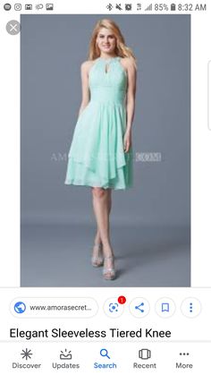 the dress is mint green and has a halter neckline