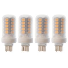 four white light bulbs on a white background