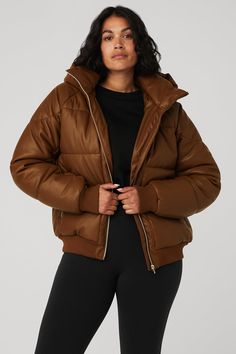 Make boss moves in the Faux Leather Boss Puffer. It’s cold-weather-approved and done in our luxe, buttery faux leather with satin lining for comfort and warmth. Zippered side pockets keep essentials secure and the classic, oversized fit makes it a must-have season after season. Luxe, buttery faux leather Satin lining Zippered side pockets & hidden internal pocket Designed & uniquely fit to flatter every size Wear-tested by our in-house team for the perfect fit Brown Down Outerwear For Fall, Fall Leather Puffer Jacket With Zipper, Leather Puffer Jacket With Zipper For Fall, Brown Down Puffer Jacket With Padded Collar, Quilted Leather Puffer Jacket For Cold Weather, Leather Puffer Jacket With Zipper For Winter, Leather Puffer Jacket With Zipper Closure For Winter, Fall Down Puffer Jacket With Faux Fur Lining, Leather Puffer Jacket For Winter