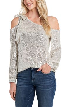 Get ready to dazzle in this sparkling, sequined top that drapes delicately from one shoulder and finishes with a feminine bow atop the other. Style Name:Cece One-Shoulder Sequin Top. Style Number: 6144594. Available in stores. Silver Sequin Top, Sequin Bow, One Shoulder Top, Long Sleeve Sequin, One Shoulder Tops, Cold Shoulder Top, Matching Family Outfits, Sequin Top, Family Outfits