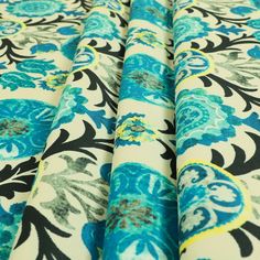 a blue and green floral print fabric