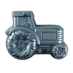 a metal toy tractor with wheels and spokes on the front is shown in silver