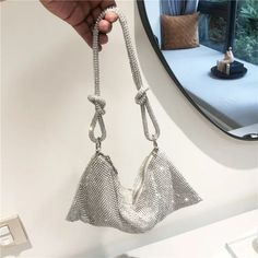 SPECIFICATIONSBrand Name: dawndessloHandbags Type: Shoulder BagsTypes of bags: SHOULDER BAGSMain Material: MetallicLining Material: POLYESTERShape: Casual TotePlace Of Origin: HE BEI ProvincePlace Of Origin: HE BEI ?ProvinceOrigin: Mainland ChinaCN: HebeiOccasion: VersatileClosure Type: zipperGender: WOMENStyle: fashionNumber of Handles/Straps: Single Crystal Handbag, Wedding Handbag, Diamond Bling, Rhinestone Clutch, Wedding Purse, Luggage Sizes, Photography Editorial, Designer Shoulder Bags, Fashion Photography Editorial