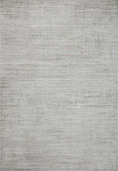 an area rug with grey and white colors