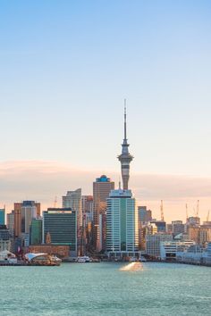 the city skyline is shown from across the water