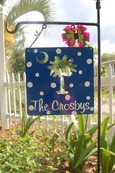 a blue sign with white polka dots and the words the crosys on it