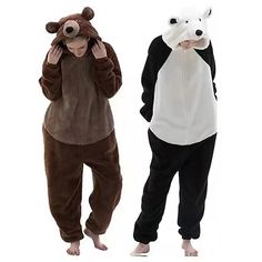 two people in animal onesuits one is wearing a bear costume and the other has a polar bear