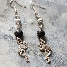 3 Inch Long Silvertone Flamingo Shaped Charm Aromatherapy Earrings. These Flamingo Shaped Charm Earrings Have A Black Lava Beads And A Silver Tone Glass Bead. $12.00 +S&H #Countrygypsyor Nickel-free Casual Party Earrings, Casual Nickel-free Earrings For Party, Casual Metal Dangle Jewelry, Casual Silver Dangle Jewelry, Casual Black Dangle Jewelry, Casual Silver Earrings For Party, Casual Black Dangle Earrings, Coach Earrings, Clear Crystal Earrings