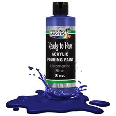 a bottle of purple acrylic paint on a white background