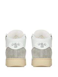 panelled design, combining smooth and suede leather in a two-tone style. Featuring perforated detailing and corduroy branded tongue, the pair showcases an angular collar for a distinguished silhouette White Basketball Shoes With Embossed Logo, White Basketball Shoes With Embossed Logo And Round Toe, Modern High-top Custom Sneakers, Custom High-top Sneakers With Embossed Logo For Streetwear, Classic High-top Custom Sneakers With Embossed Logo, Luxury High-top Sneakers With Contrast Sole For Streetwear, Modern Medium Fit High-top Sneakers For Streetwear, Classic High-top Sneakers For Streetwear With Perforations, Modern High-top Custom Sneakers With Medium Fit