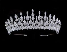 Stunning 2" Tall CZ Tiara Crown This gorgeous tiara crown will add a regal touch to your wedding ensemble. This headpiece is available in silver, gold or rose gold plating and sparkles with high quality multi shaped cz crystals in an intricately detailed 3D design. Measuring 2" tall at its center peak, this tiara will be a glamorous accessory to add elegance to your wedding day or quinceanera. Color: Silver, Gold or Rose Gold. Style: hp1006. Size: The decoration is 2 " tall at the center peak an Quinceanera Tiaras, Bling Wedding, Tiara Crown, Royal Weddings, Glam Wedding, Wedding Tiara, Fairy Tale Wedding, Dress Jewelry, Tiaras And Crowns