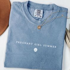 Pregnant Girl Summer Shirt, Comfort Colors Beach Pregnancy Announcement T-shirt, Pregnancy Reveal Tee, Baby Shower Gift, Mom Shirt ♥ DESCRIPTION: This is a Comfort Colors Unisex t-shirt that is 100% ring-spun cotton, soft-washed, garment-dyed fabric brings extra coziness to your wardrobe while the relaxed fit makes it an excellent daily choice. The double-needle stitching throughout the tee makes it highly durable while the lack of side-seams helps the shirt retain its tubular shape. ♥ BRAND: Co Cute Summer Tops For Gender Reveal, Summer Short Sleeve Tops For Gender Reveal, Short Sleeve Tops For Summer Gender Reveal, Short Sleeve T-shirt For Gender Reveal In Summer, Cute Maternity T-shirt With Letter Print, Cotton T-shirt For Gender Reveal, Relaxed Fit, Summer Family Matching Tops For Gender Reveal, Blue Name Print T-shirt For Summer, Cute Maternity Cotton T-shirt