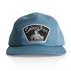 The Salty Joe's Back From The Depth Patch Five Panel Hat is our first five panel surf hat. Five panel hats are becoming very popular in surf culture so we decided to make our own. Our Back From The Depths patch is sewn into the 100% cotton five panel hat to ensure the highest possible durability. The blend of surf and fishing culture makes this surf hat a must-have. Get yours today with free shipping on orders $65+  100% Cotton  Five panel hat  Low profile Metal side eyelets Mid weight Buckle closure Adjustable Blue 5-panel Bucket Hat, Adjustable 5-panel Dad Hat For Beach, Cotton 5-panel Trucker Hat For Beach, Adjustable Trucker Dad Hat With 5 Panels, Adjustable Trucker Dad Hat, Beach Dad Hat With Flat Bill, Blue 5-panel Beach Hats, Blue 5-panel Snapback Hat For Beach, Adjustable 5-panel Snapback Hat For Skateboarding