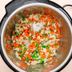 the vegetables are mixed together in the pot