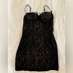 Fashion Nova Never Worn Black Lace Mini Dress Size Large Black Lined Bodycon Dress, Fitted Lace Mini Dress With Lining, Fitted Black Mini Dress With Lace Trim, Fitted Black Lace Bodycon Dress, Black Sleeveless Lace Mini Dress, Black Lace Bodycon Dress With Lace Trim, Black Lace Mini Dress With Spaghetti Straps, Black Lace Trim Bodycon Dress For Party, Black Lined Mini Bodycon Dress