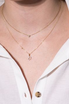 This diamond initial pendant necklace is the perfect way to show your style every day in glamour. Created in brightly polished 14k yellow gold, this beautiful diamond initial pendant can be customized with the letter of your selection. The diamond initial pendant is placed on a tapered bail with a sturdy chain threaded through, making it ready for gifting and wear.Purchase multiple initials and letters and create a unique look just for you. Sparkling diamonds adorn the front of the pendant, addi Diamond Initial Necklace, Initial Pendant Necklace, Initial Pendant, Sparkle Diamonds, Initial Necklace, Initials, Diamonds, Yellow Gold, Pendant Necklace