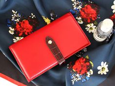 Red cowhide leather bifold wallet for women _ it's a perfect gift for her.💓  It is 100% handmade with the highest quality cow leather which in turn guarantees a long time of use. Every detail of this wallet emphasizes its owners refinement. The wallet has enough compartments to store your cash, credit cards, tickets and some little things that you may need to carry with you, all internal compartments are carefully thought out and planned for ease to use. 🔸PRODUCT FEATURES *Highest quality natural leather. *Very comfortable & Light.  *8 Credit Card Slots. *two full size hidden compartments for bills or notes. *Separating zipper pocket. *snap button closure. *Leather interior and high quality fabric lining.   🔸DIMENSIONS:  Height 11cm /  4.33 inches Length 20cm / 7.87 inches 🔸SHIPPING IN Designer Wallet, Womens Wallet, Red Wallet, Wallet For Women, Wallets For Women Leather, Brown Leather Bag, Wallet Pouch, Leather Bifold Wallet, Designer Wallets