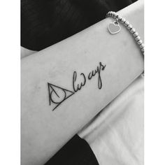 a woman's arm with the word always written on it