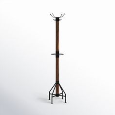 a coat rack with two coats on it