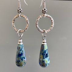 "Blue Czech Earrings - Cobalt blue with earthy Picasso finish dangle from small Antiqued Silver plated Hoops.  It was hard to capture the beauty of the Czech beads. Antiqued Silver plated Earwires The bead finish varies with each bead.  This is a stock photo. Earrings measure just over 2.25\" from top of earwires to bottom of beads." Blue Dangle Hoop Earrings, Blue Hoop Earrings With Ear Wire, Blue Metal Dangle Hoop Earrings, Blue Hypoallergenic Hoop Earrings, Blue Dangle Hoop Earrings Hypoallergenic, Handmade Blue Teardrop Hoop Earrings, Blue Nickel-free Long Drop Teardrop Earrings, Blue Teardrop Dangle Earrings, Blue Dangle Teardrop Earrings For Pierced Ears