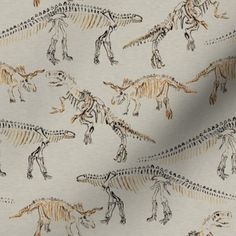 an image of dinosaurs on white fabric